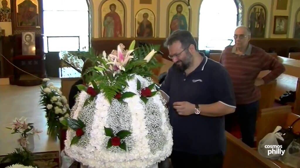 Evangelismos church members gather to decorate Epitafio
