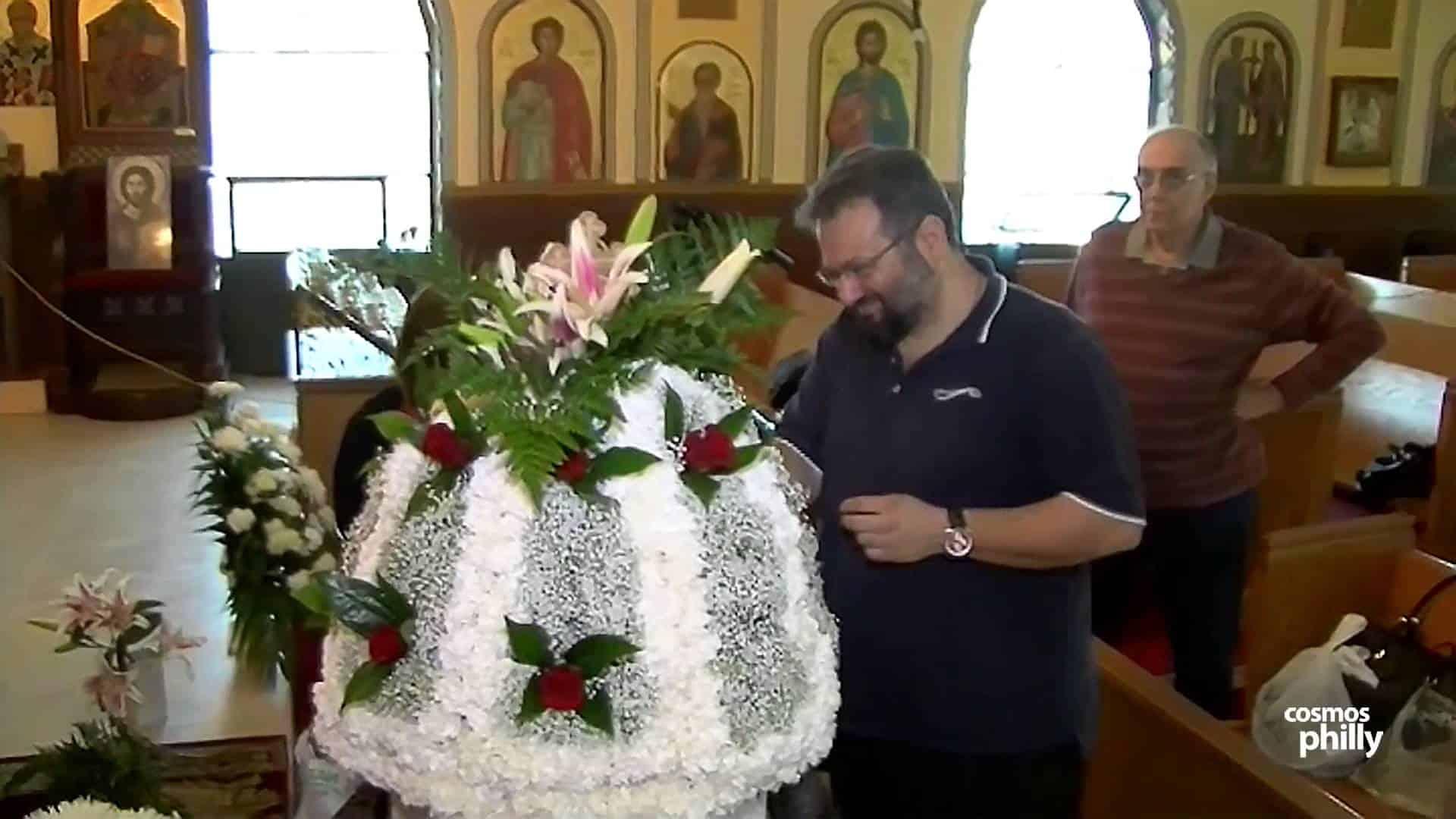 Evangelismos church members gather to decorate Epitafio