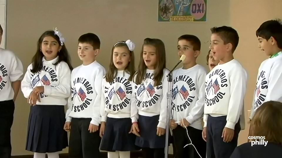 Dressed in Blue and White, Greek School Students Celebrate OXI Day
