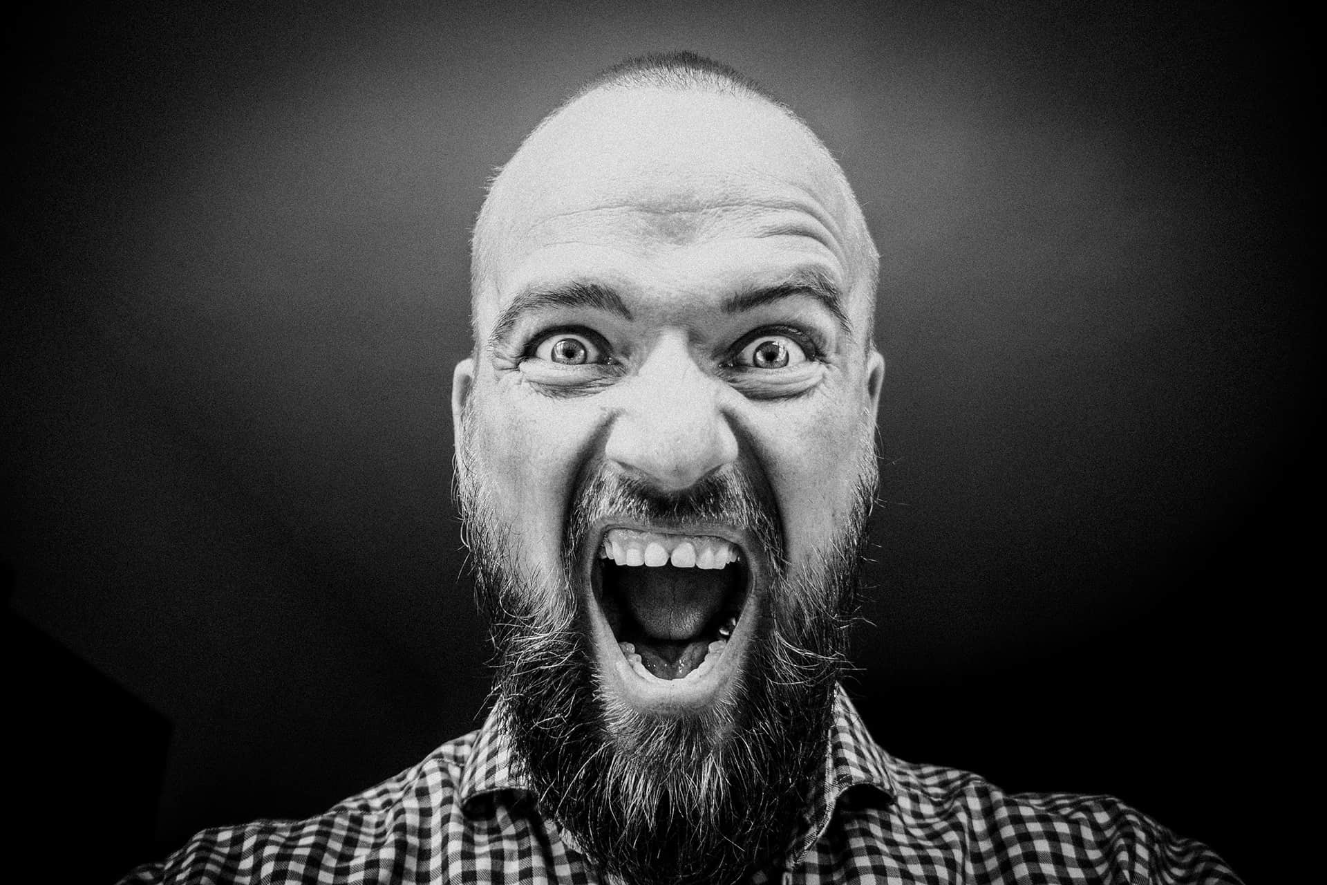 man opening his mouth