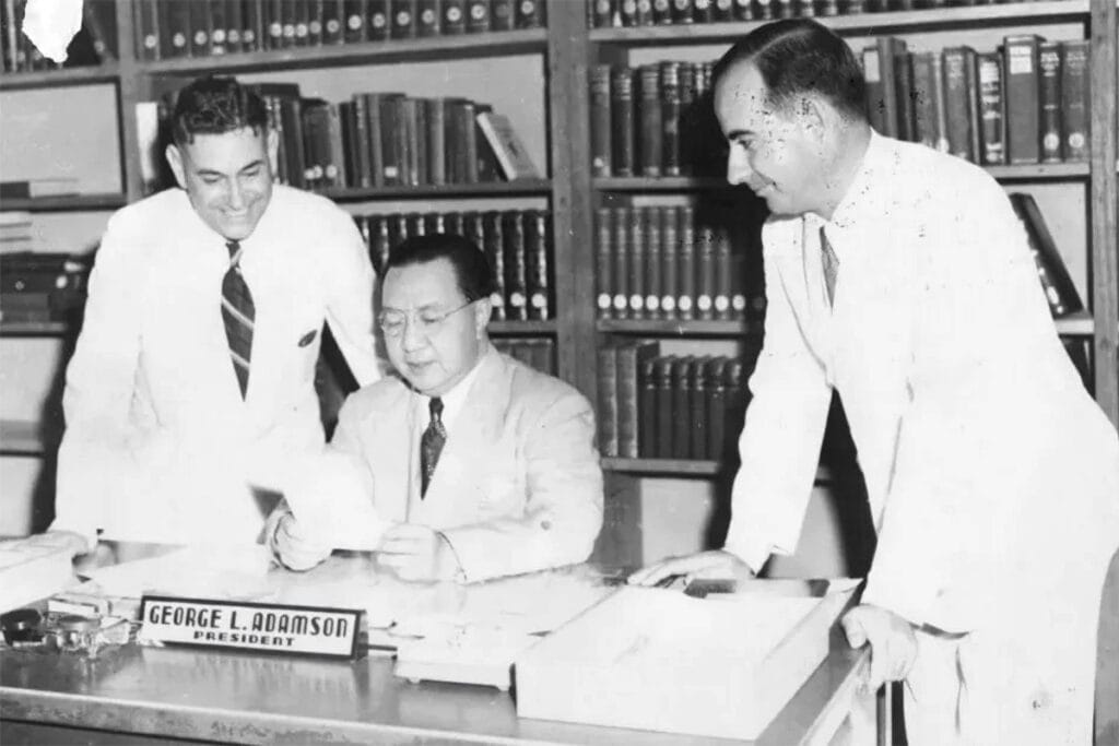 President of the Philippines, Elpidio Quirino, with Dr. George Lucas Adamopoulos and his cousin Alexander Adamopoulos, receiving an honorary doctorate in 1948.