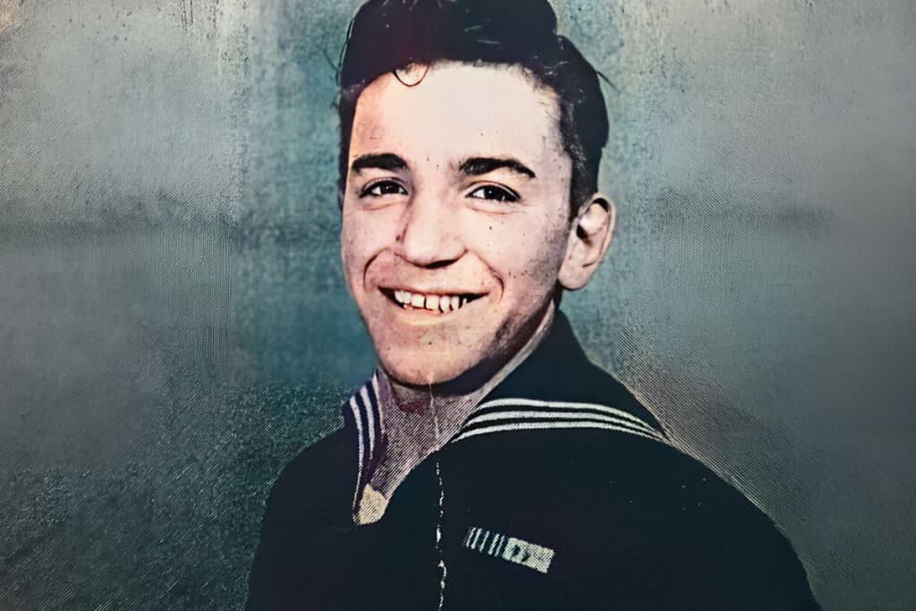 Gust Constantine Katsikas smiling in his U.S. Navy uniform during World War II.