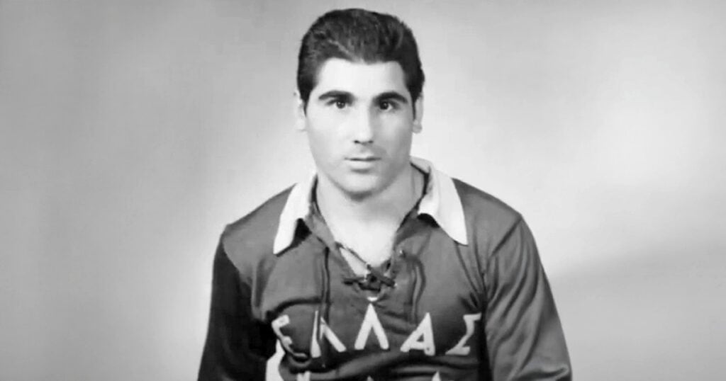 Young Zino Kazakis wearing a vintage soccer jersey with the word "ΕΛΛΑΣ" (Greece) across the front, circa 1959