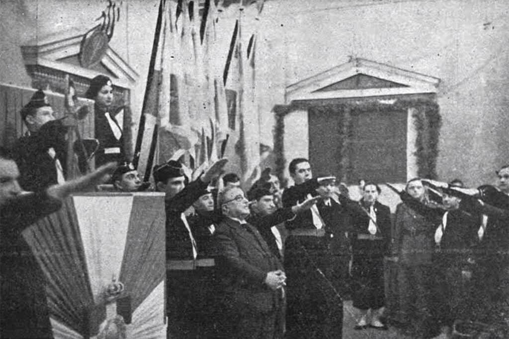 Photo of young members of the Greek National Organisation of Youth (EON) giving the fascist salute to Ioannis Metaxas during a public ceremony in 1930s Greece