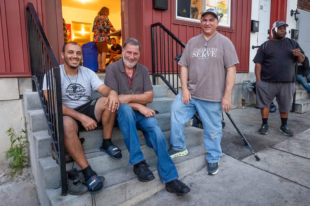 John Pogas with Joe Williams and Mike Kingsley outside the Upper Room in Norristown.