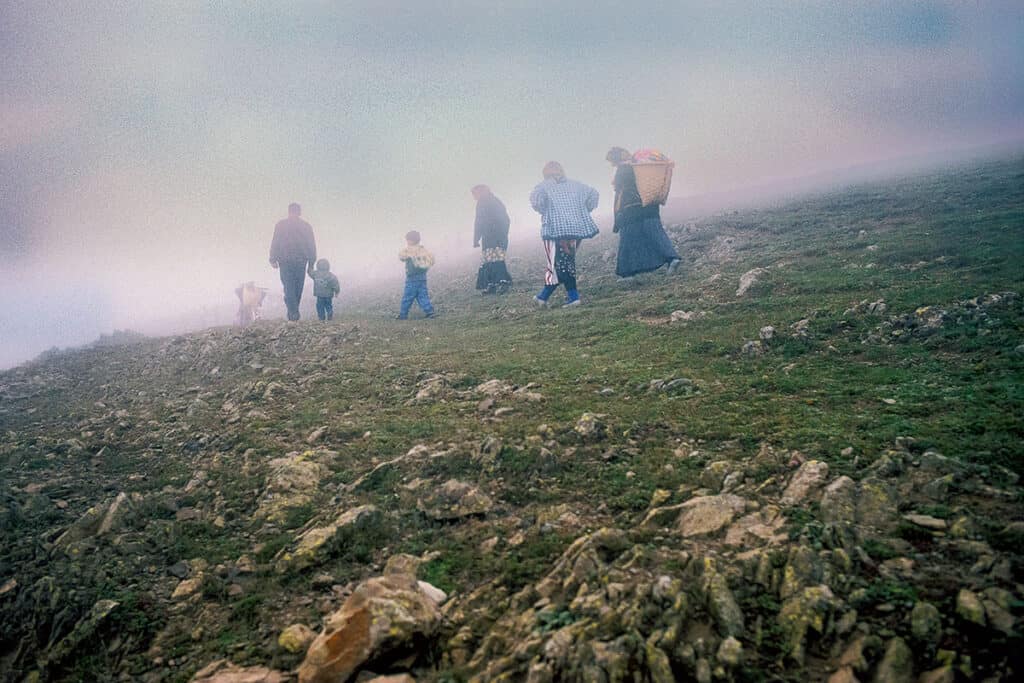 A Pontic family walks through the misty highlands of Kadırga Yaylası in Trabzon Province.
