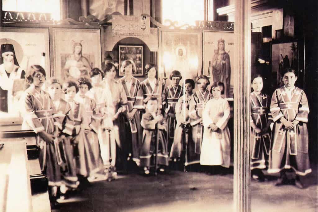 Vested altar girls standing before the iconostasis inside St. George Greek Orthodox Cathedral, Philadelphia, 1927.