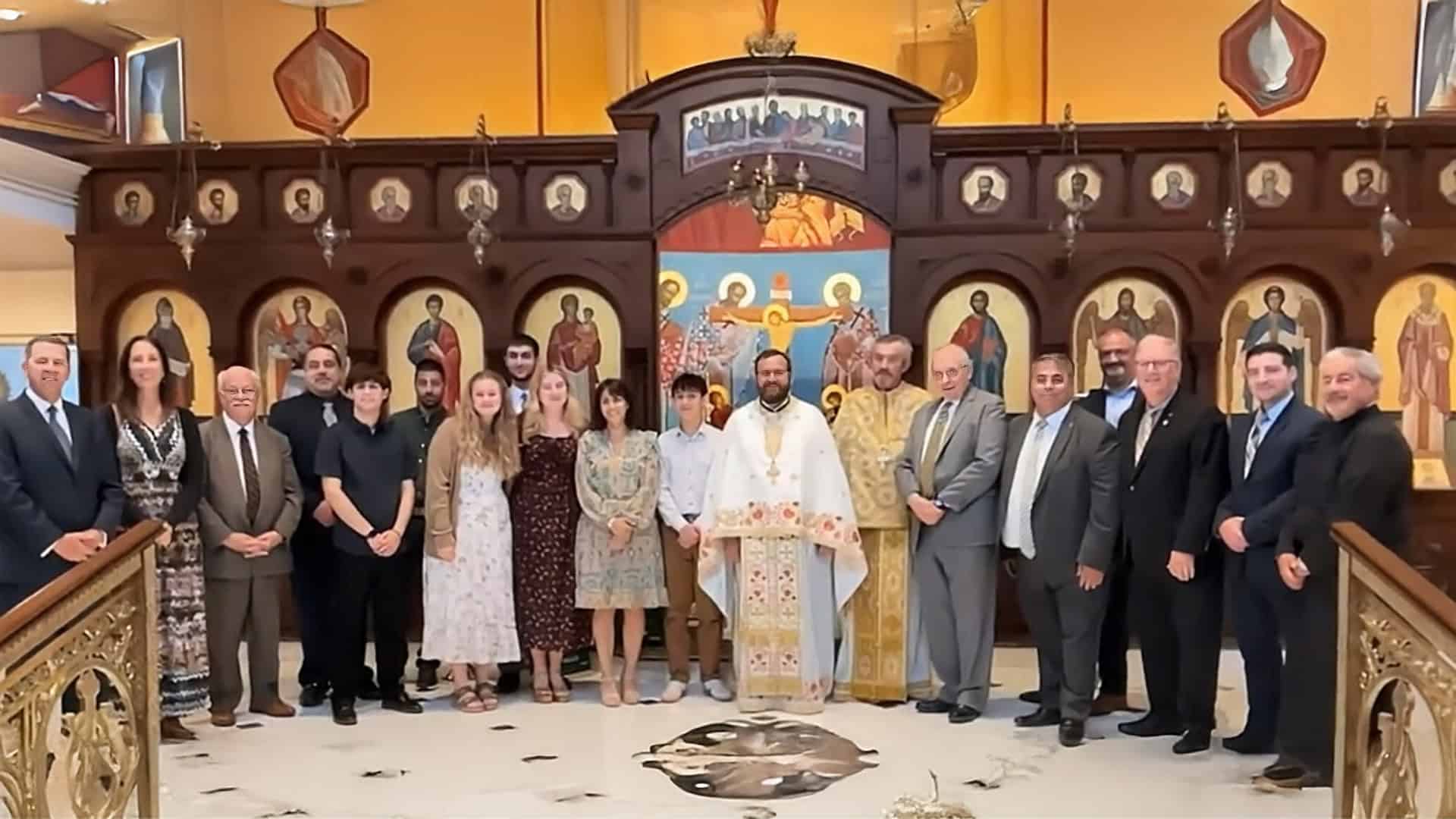 Father Georgios Oikonomou with family, clergy, and parish council members after his first Divine Liturgy at Saint Thomas Greek Orthodox Church in Cherry Hill, NJ