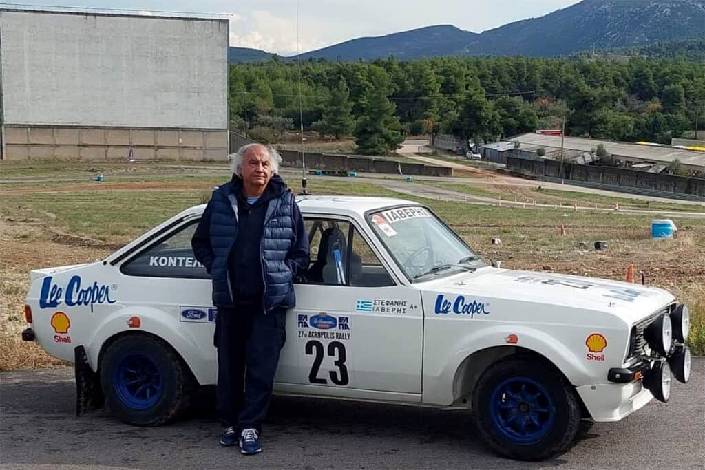 Tasos Markouizos, known as Iaveris, standing beside his rally car