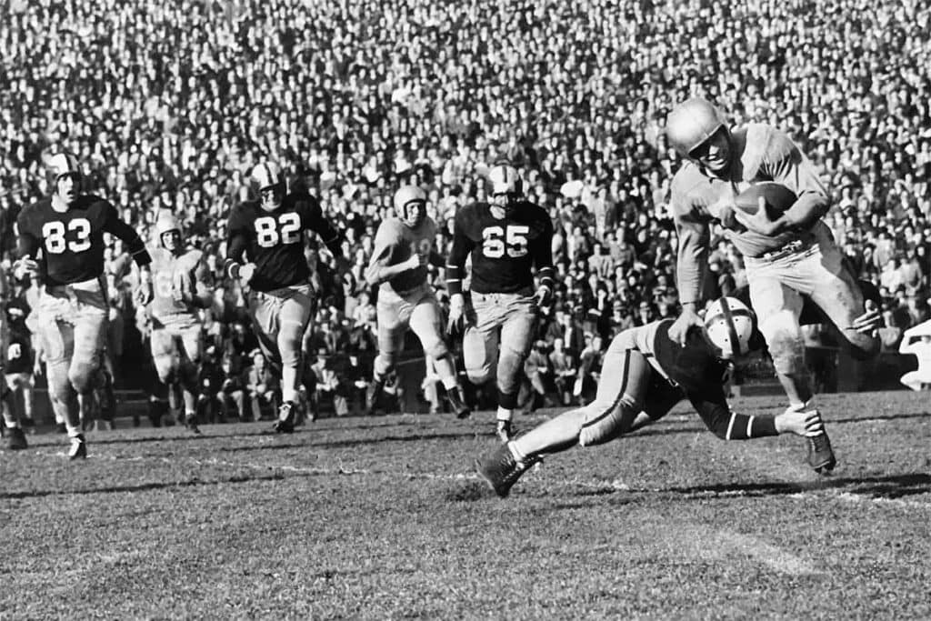 The Columbia Lions in action before a packed stadium.