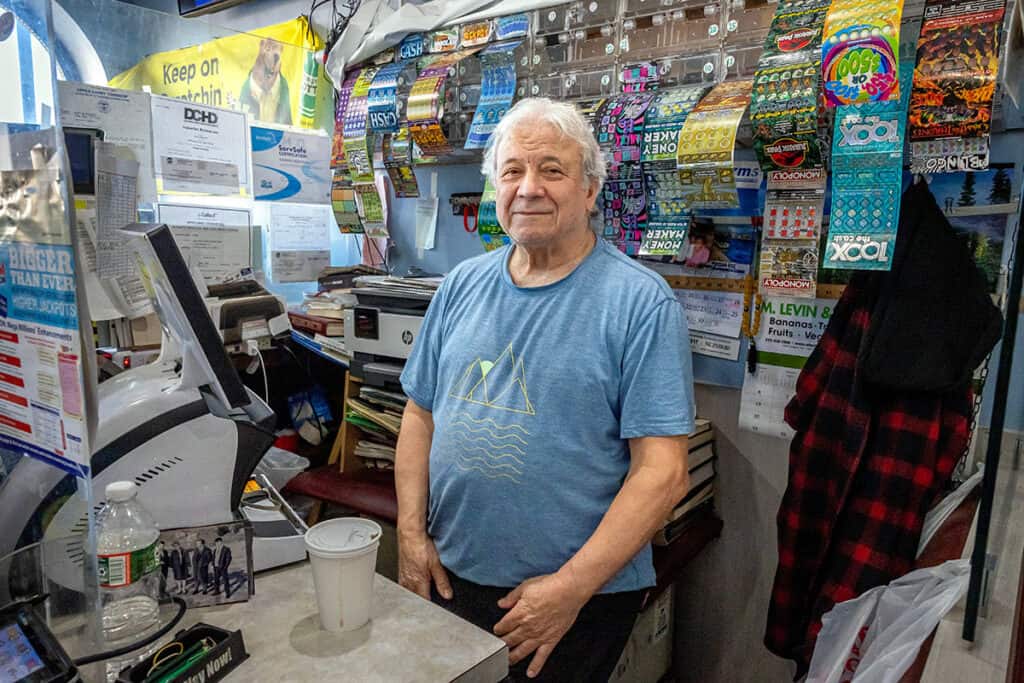 John Kontaxis standing behind the counter at Aquarius Restaurant in Upper Darby.
