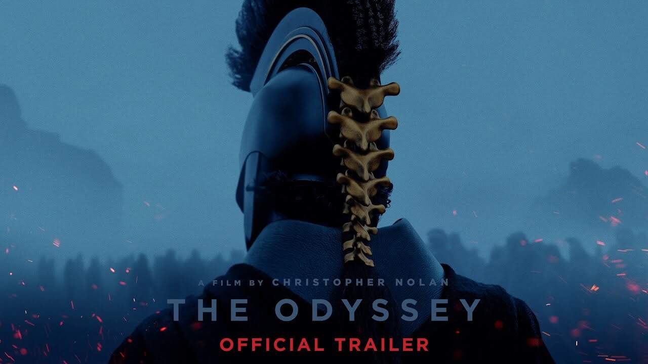 Official trailer image for Christopher Nolan’s The Odyssey (2026), showing a helmeted figure from behind in a dark, atmospheric setting.