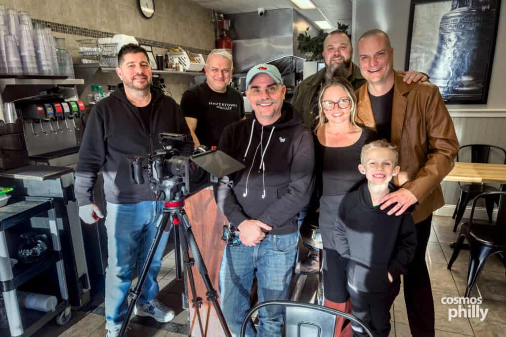 Ray Martin and family with Nick Haselidis, Yiannis Akritidis, and the Havertown Grille film crew during filming of Brick City Hustle in Havertown.