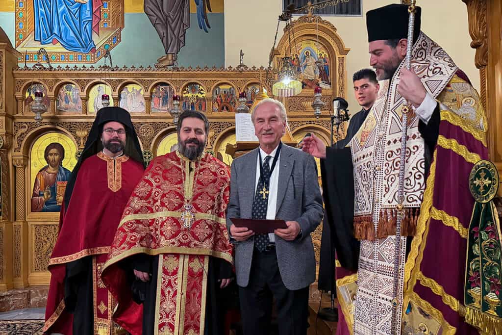 Demos Vasiliou with clergy after receiving the Golden Cross at St. Demetrios Greek Orthodox Church in Upper Darby