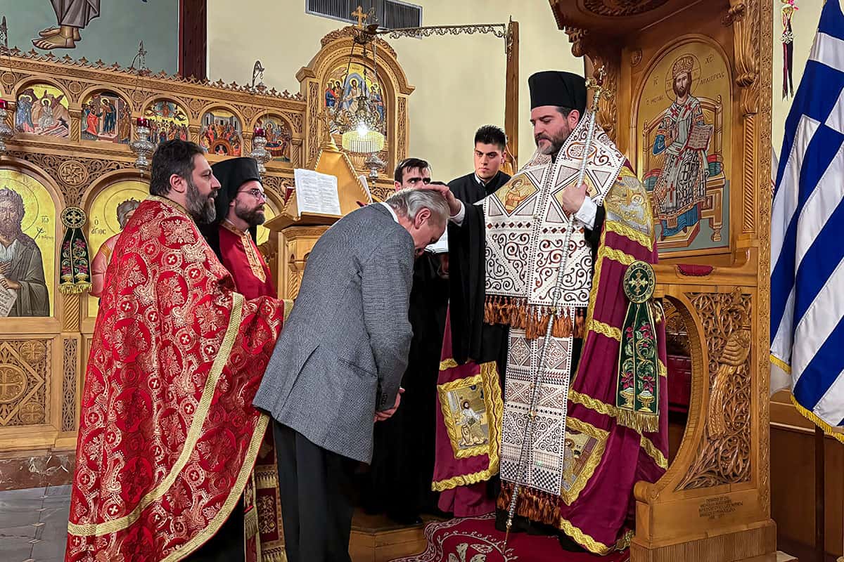Demosthenes “Demos” Vasiliou receives the Golden Cross during a service at St. Demetrios Greek Orthodox Church in Upper Darby