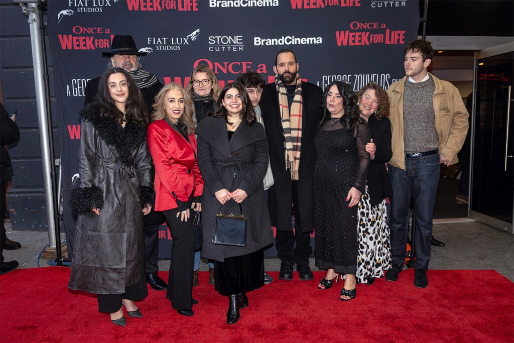 George Zouvelos with family members at the film premiere in New York City