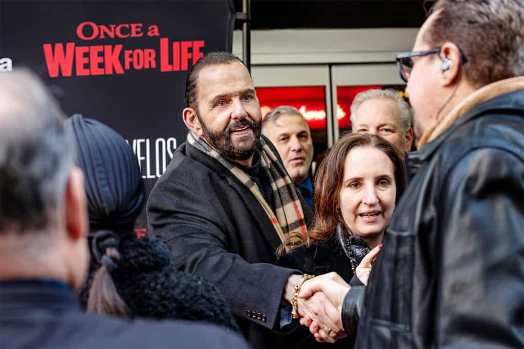 George Zouvelos greeting cinematographer George Mitas at the film premiere