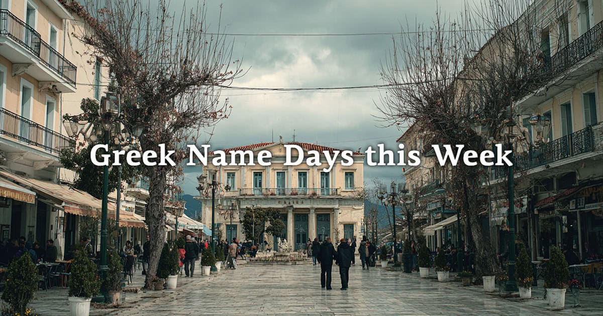 Greek town square with shops, cafés, and people walking on a cloudy late-March day.