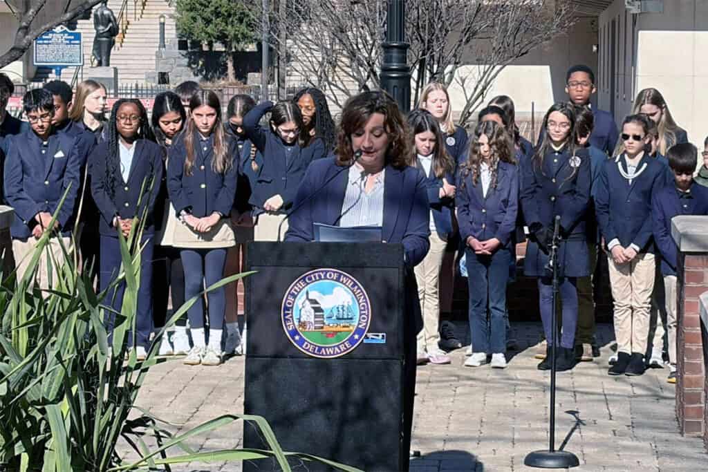 Speaker at podium during Greek Independence Day event in Wilmington Delaware