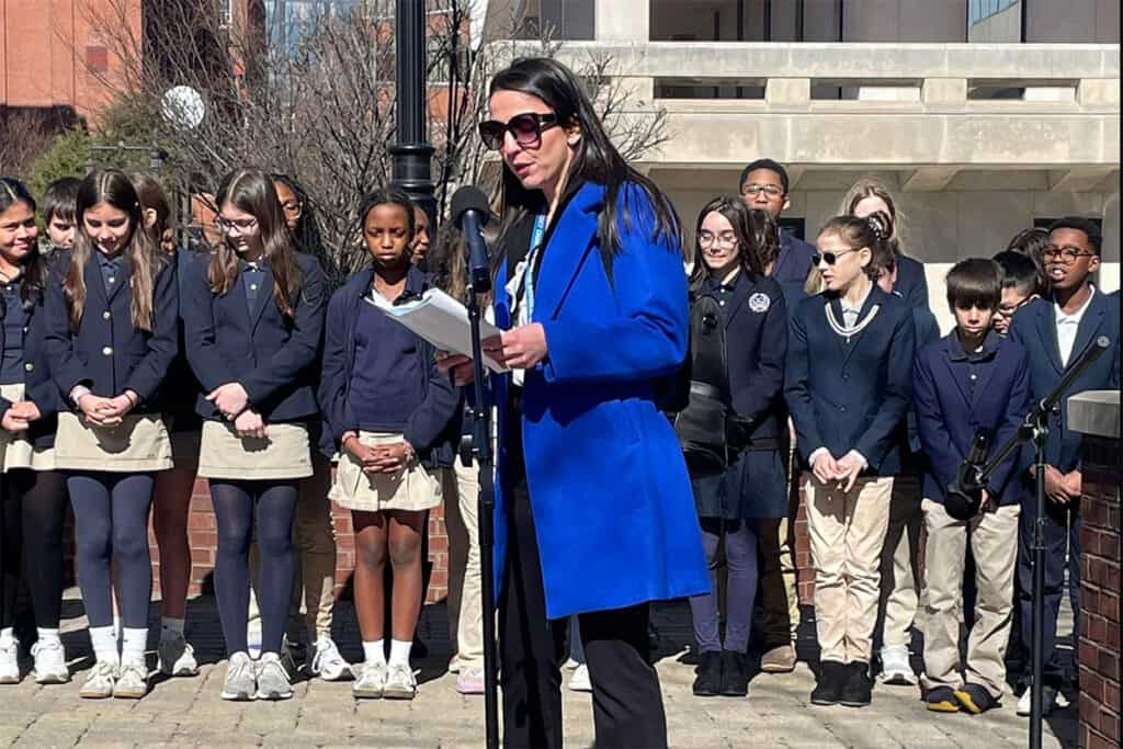 Speaker addresses students during Greek Independence Day ceremony in Wilmington