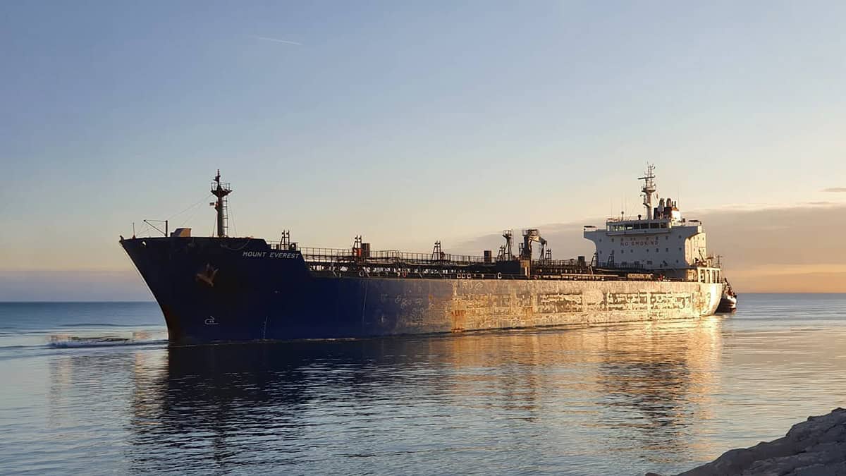Oil tanker transporting crude oil at sea, part of global energy shipping routes through the Strait of Hormuz.
