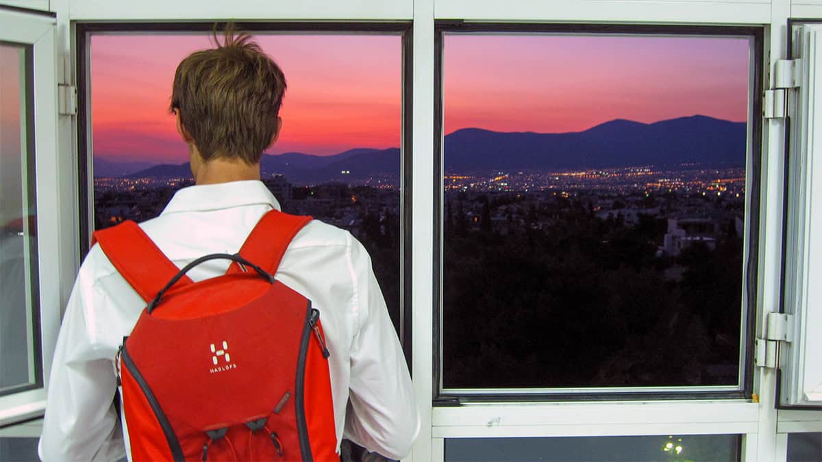 View from a window at KAT Hospital in Athens overlooking the city at sunset