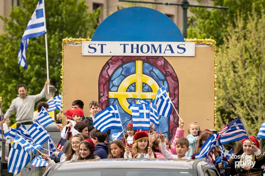 Parish communities marching with banners during the 2026 Philadelphia Greek Independence Day Parade.