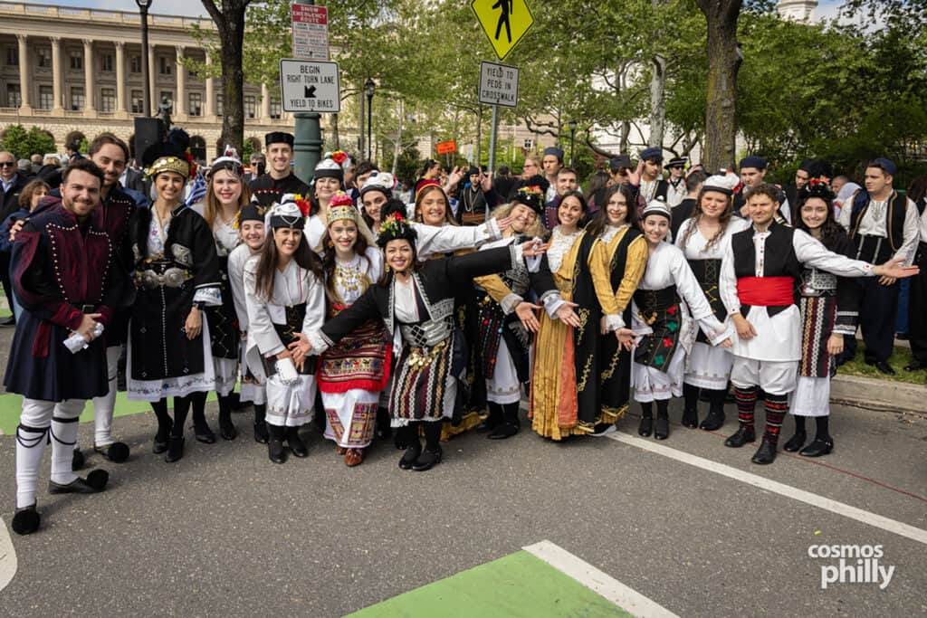 Greek dance groups in traditional dress during the 2026 Philadelphia Greek Independence Day Parade.