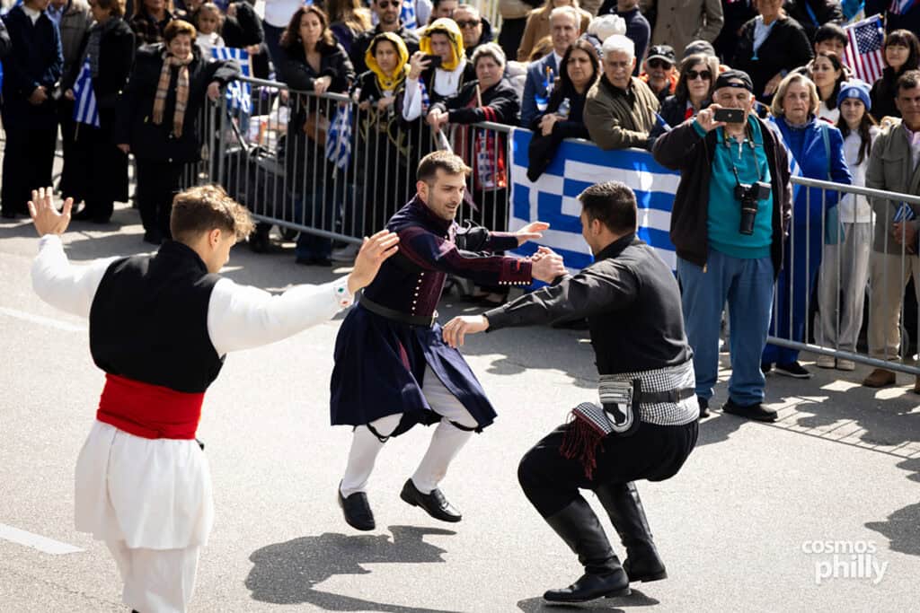 Greek dance groups in traditional dress during the 2026 Philadelphia Greek Independence Day Parade.