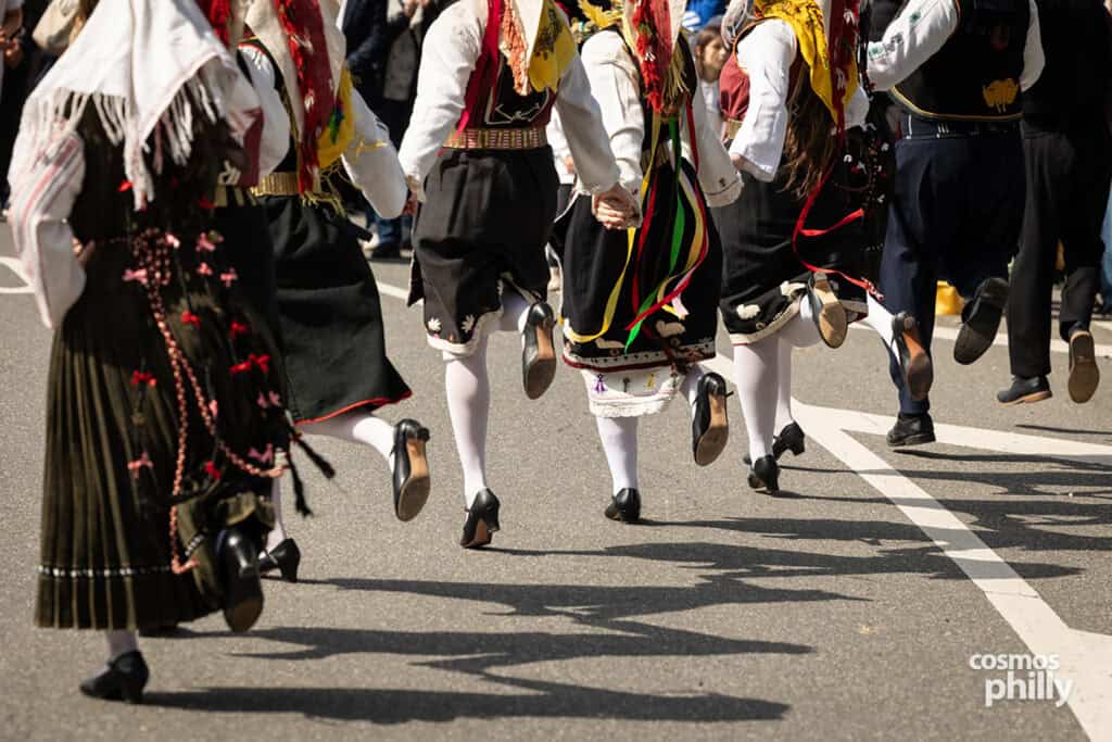 Greek dance groups in traditional dress during the 2026 Philadelphia Greek Independence Day Parade.
