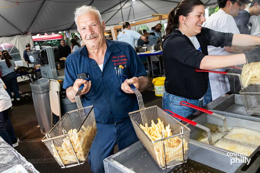 Parish volunteers serve guests during the 2026 OPA! Festival at Annunciation Greek Orthodox Church.