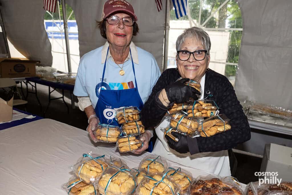 Parish volunteers serve guests during the 2026 OPA! Festival at Annunciation Greek Orthodox Church.