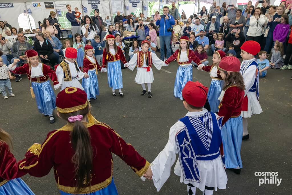 Greek dancers perform in traditional costumes at the 2026 OPA! Festival in Elkins Park.