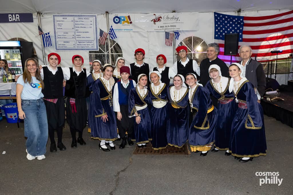 Greek dancers in traditional costumes at the 2026 OPA! Festival in Elkins Park.