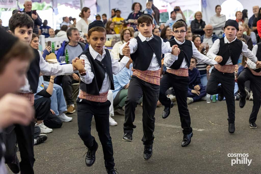Greek dancers perform in traditional costumes at the 2026 OPA! Festival in Elkins Park.