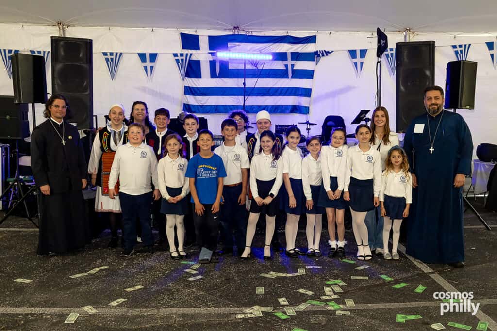 Scenes from the St. Demetrios Greek Wine and Food Festival in Upper Darby, with guests, food, dancing, volunteers, and activity under the festival tent.