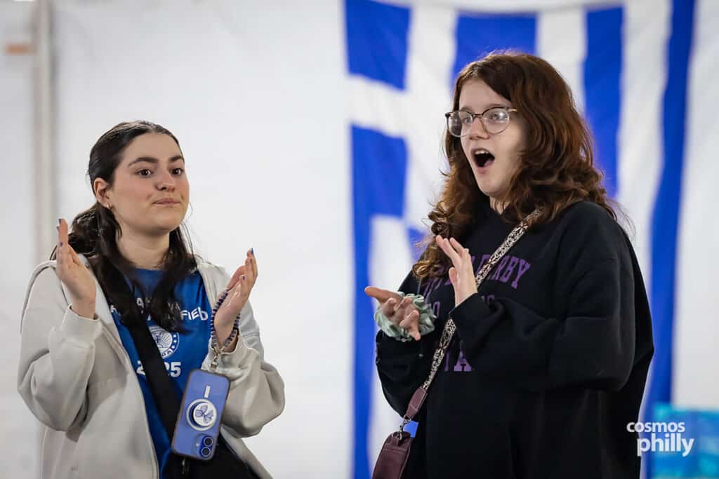 Scenes from the St. Demetrios Greek Wine and Food Festival in Upper Darby, with guests, food, dancing, volunteers, and activity under the festival tent.