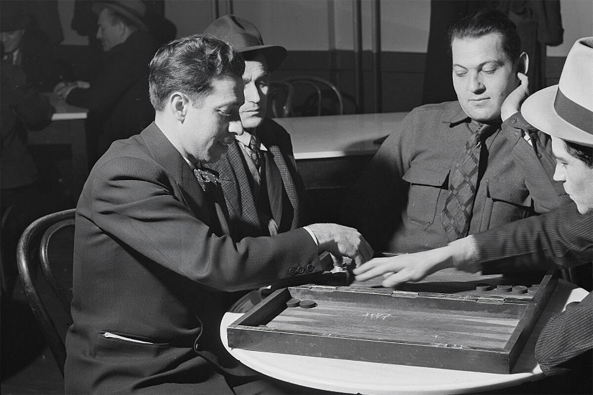 Men play backgammon inside a Greek restaurant in Aliquippa, Pennsylvania, in 1941.