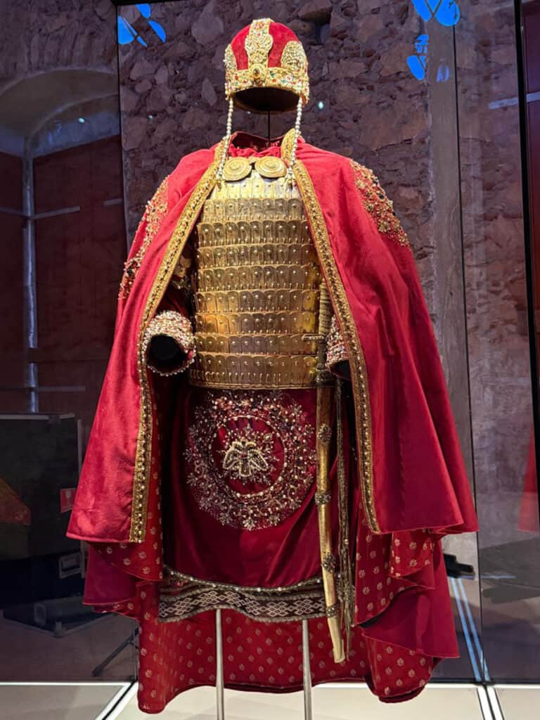 Court garment inspired by Constantine Palaiologos displayed inside the Palace of the Despots in Mystras