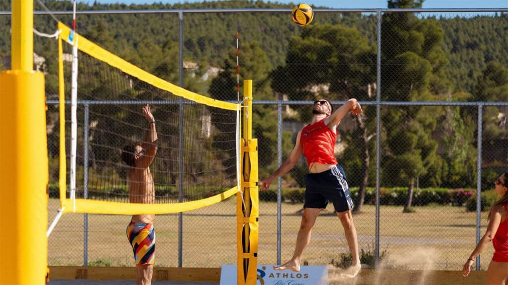 Beach volleyball players compete during Porto Carras Athlos in Sithonia.