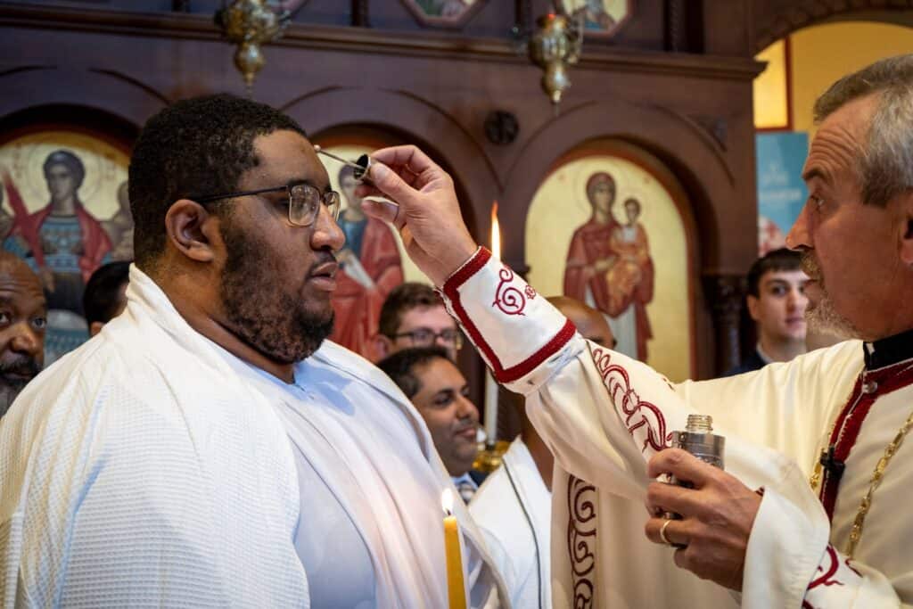 New members are welcomed into the Orthodox Christian faith at St. Thomas Greek Orthodox Church in Cherry Hill.