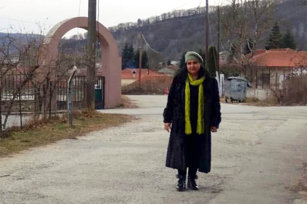 Ylvia Asal stands on a road in Drama, Greece, during a 2016 visit connected to her family history.