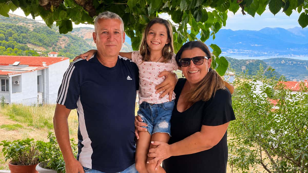 Dr. Alexandra Mylonas with her husband and daughter Georgia in Greece