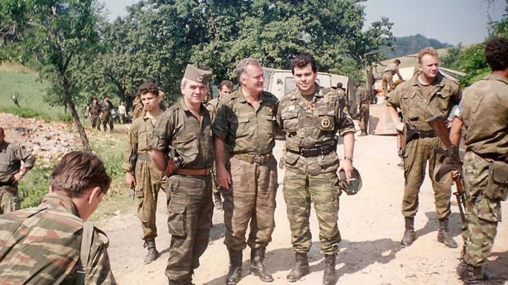 Ratko Mladić with Zvonko Bajagić and Greek Volunteer Guard commander Antonis Mitkos in Srebrenica on July 11, 1995.