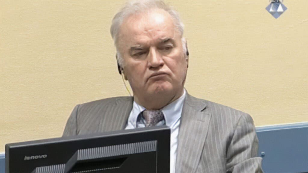 Ratko Mladić seated in the courtroom during proceedings before the International Criminal Tribunal for the former Yugoslavia.