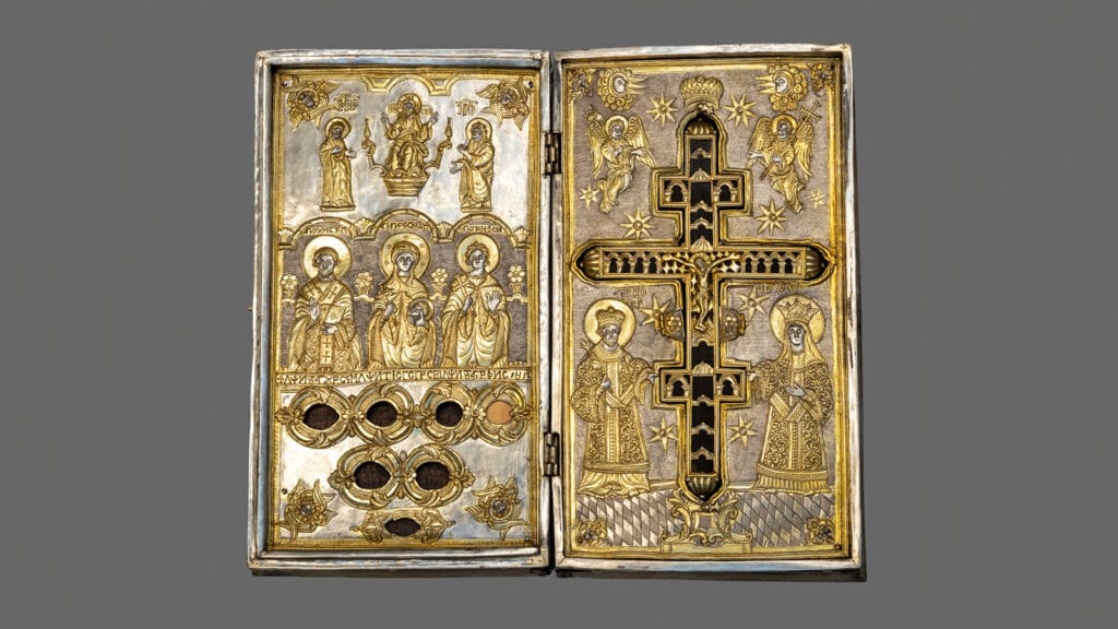 Open silver-gilt reliquary depicting Saints Constantine and Helen, Saint Paraskevi, and other religious figures, dated 1812–1821.